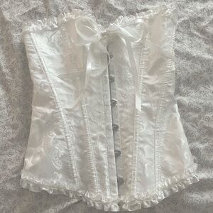 Corset top size small in perfect condition with adjustable back ribbon